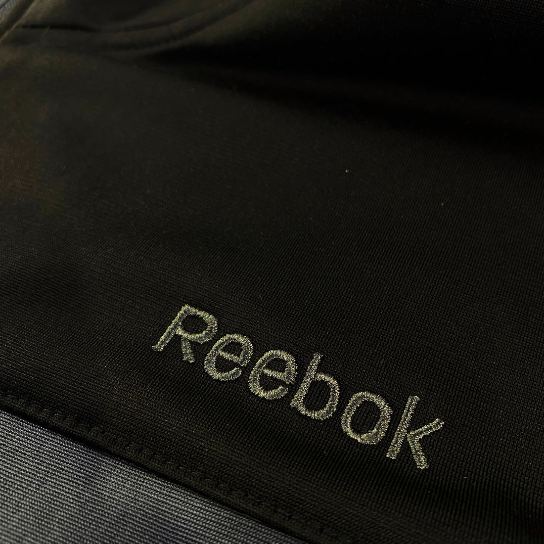 Chaqueta Chándal Reebok Cremallera Banda Pecho Negra