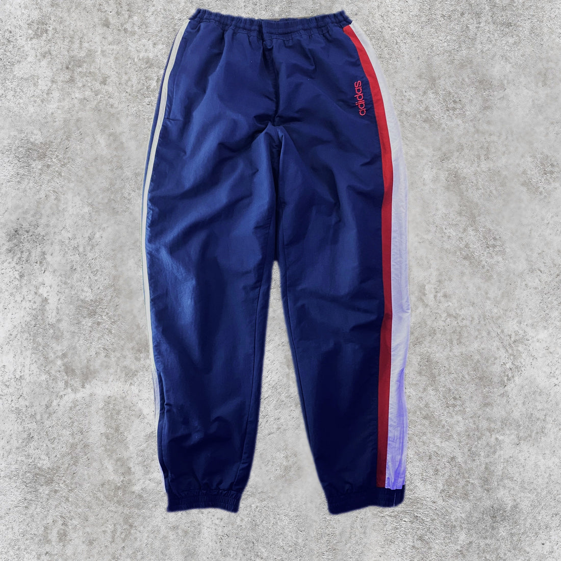 Pantalón adidas Vintage Banda Blanca y Roja Azul Marino