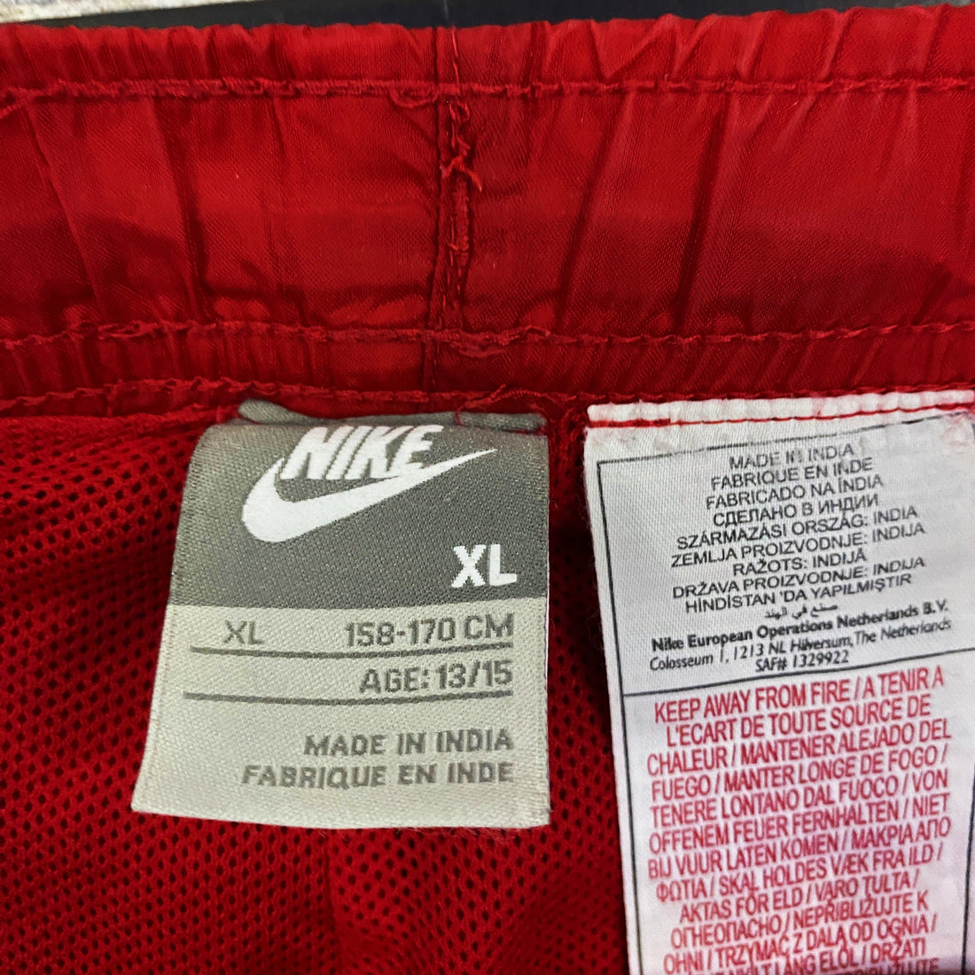 Pantalón Cortavientos Nike Swoosh Rojo