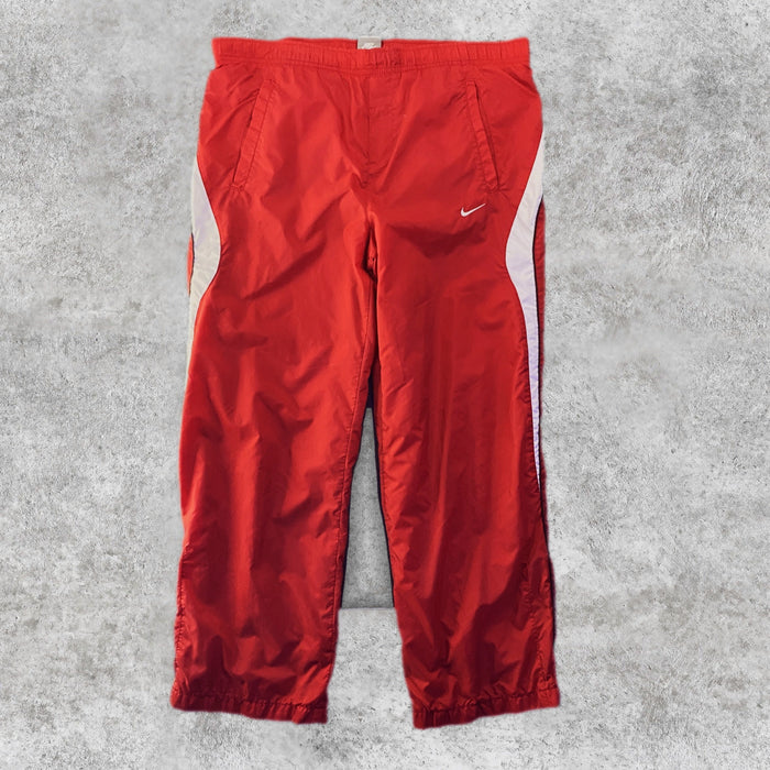 Pantalón Cortavientos Nike Swoosh Rojo