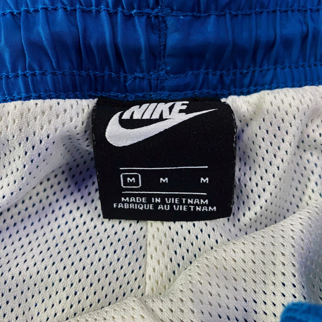 Pantalón Cortavientos Nike Paneles Blanco y Granate Azul