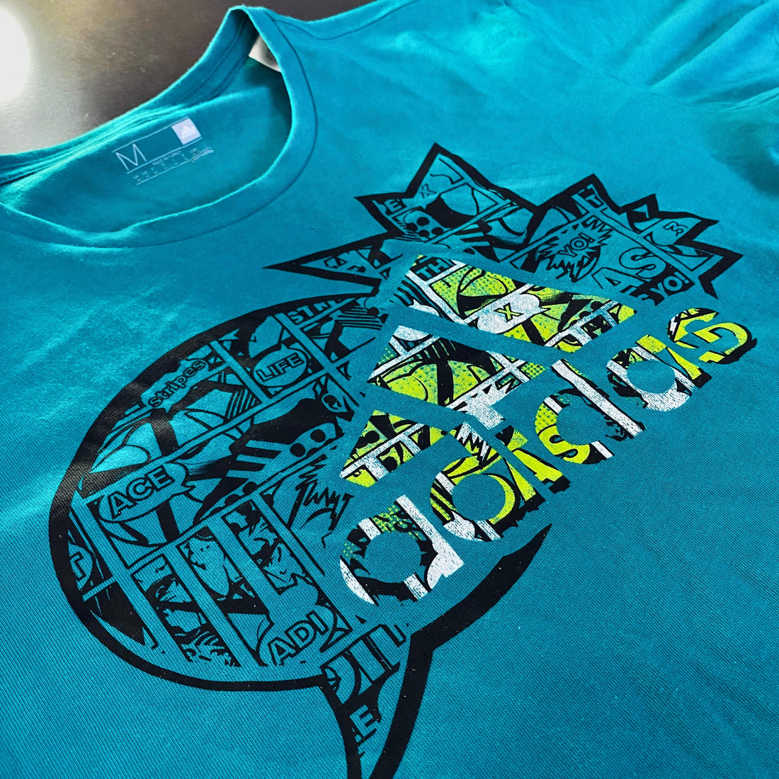 Camiseta Adidas Climalite Graphic "Comic & Pop Art"