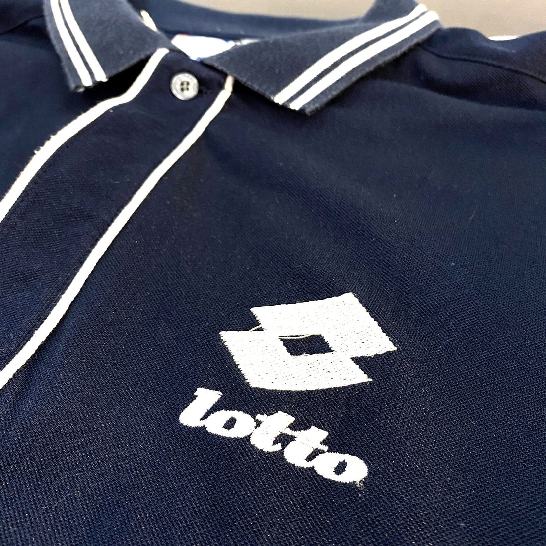 Polo Lotto - detalle logo