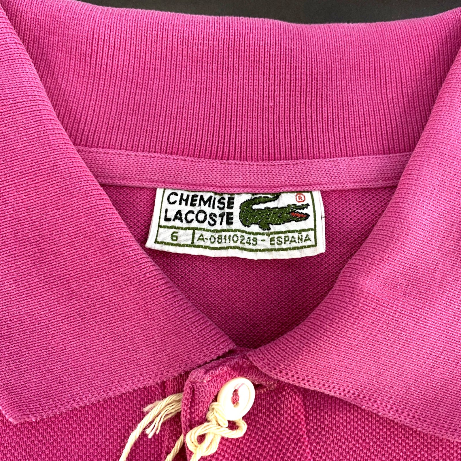 Polo Lacoste rosa - etiqueta talla 6