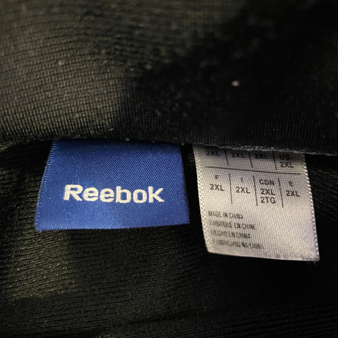 Chaqueta Reebok detalle
