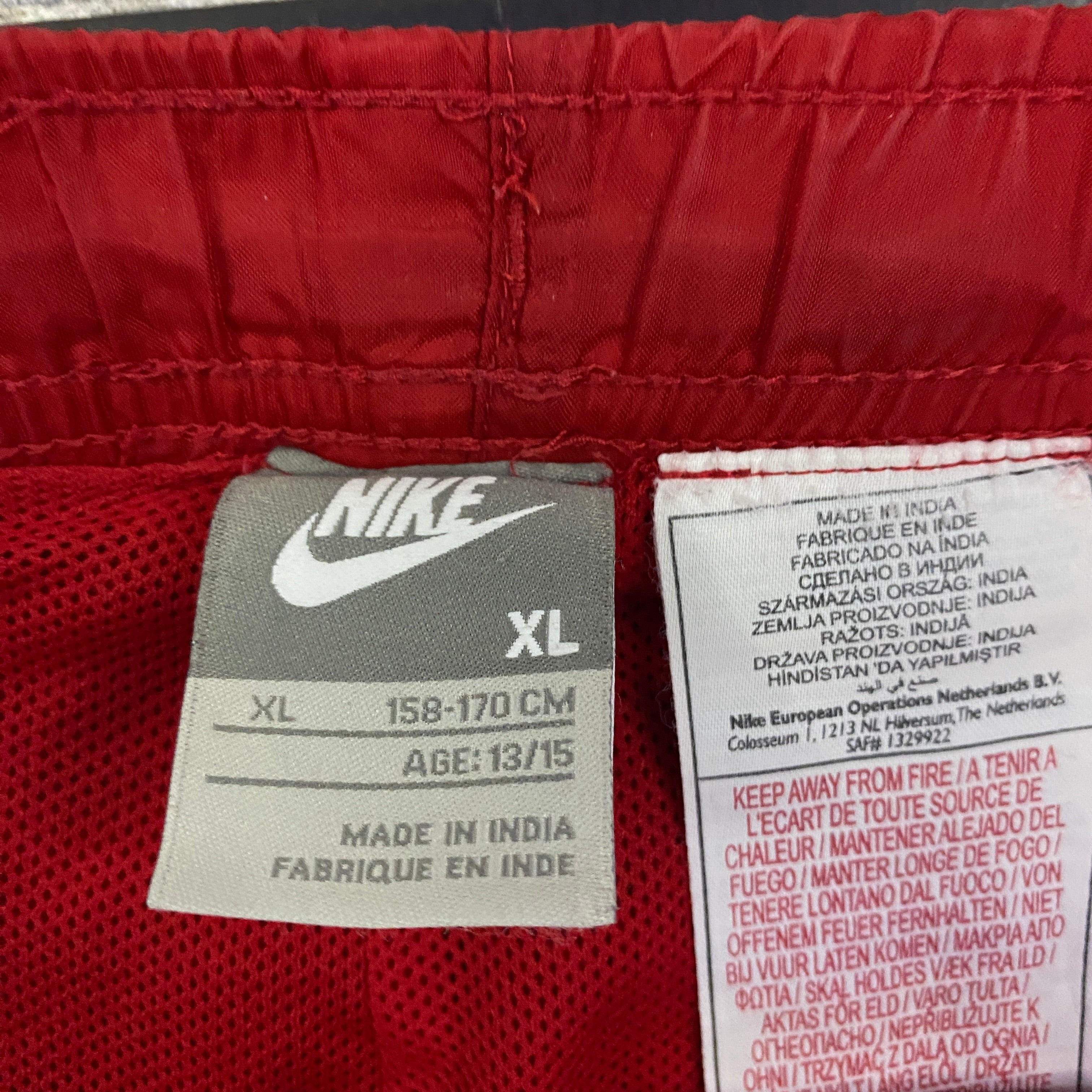 Pantalón Cortavientos Nike Swoosh Rojo