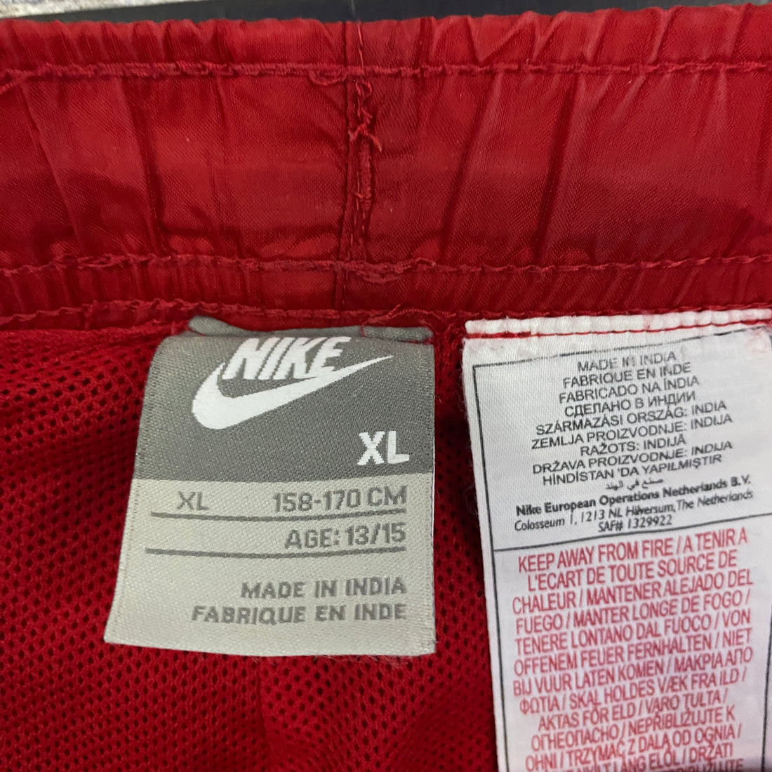 Pantalón Cortavientos Nike Swoosh Rojo