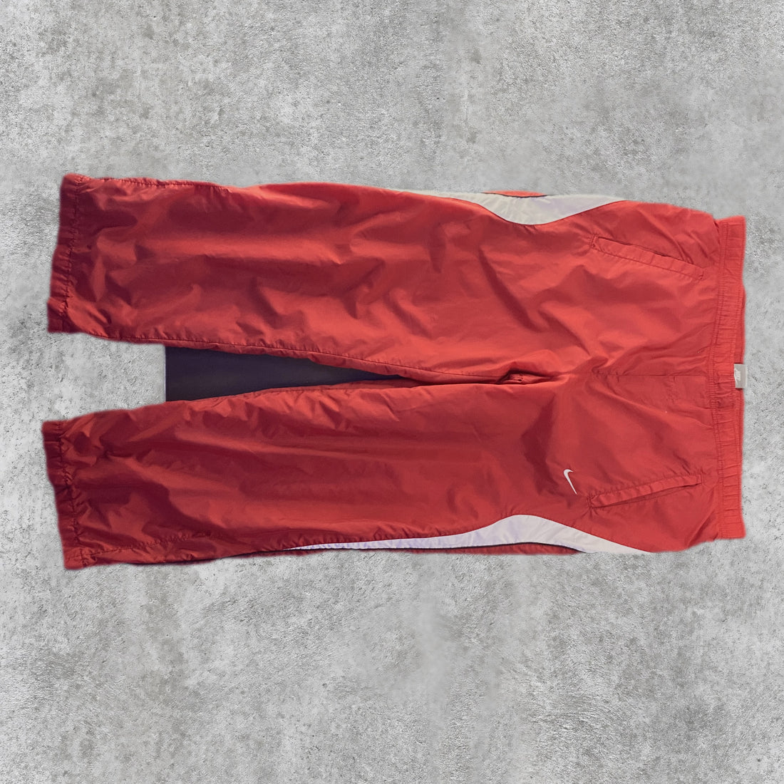Pantalón Nike Chándal Cortavientos Rojo frontal