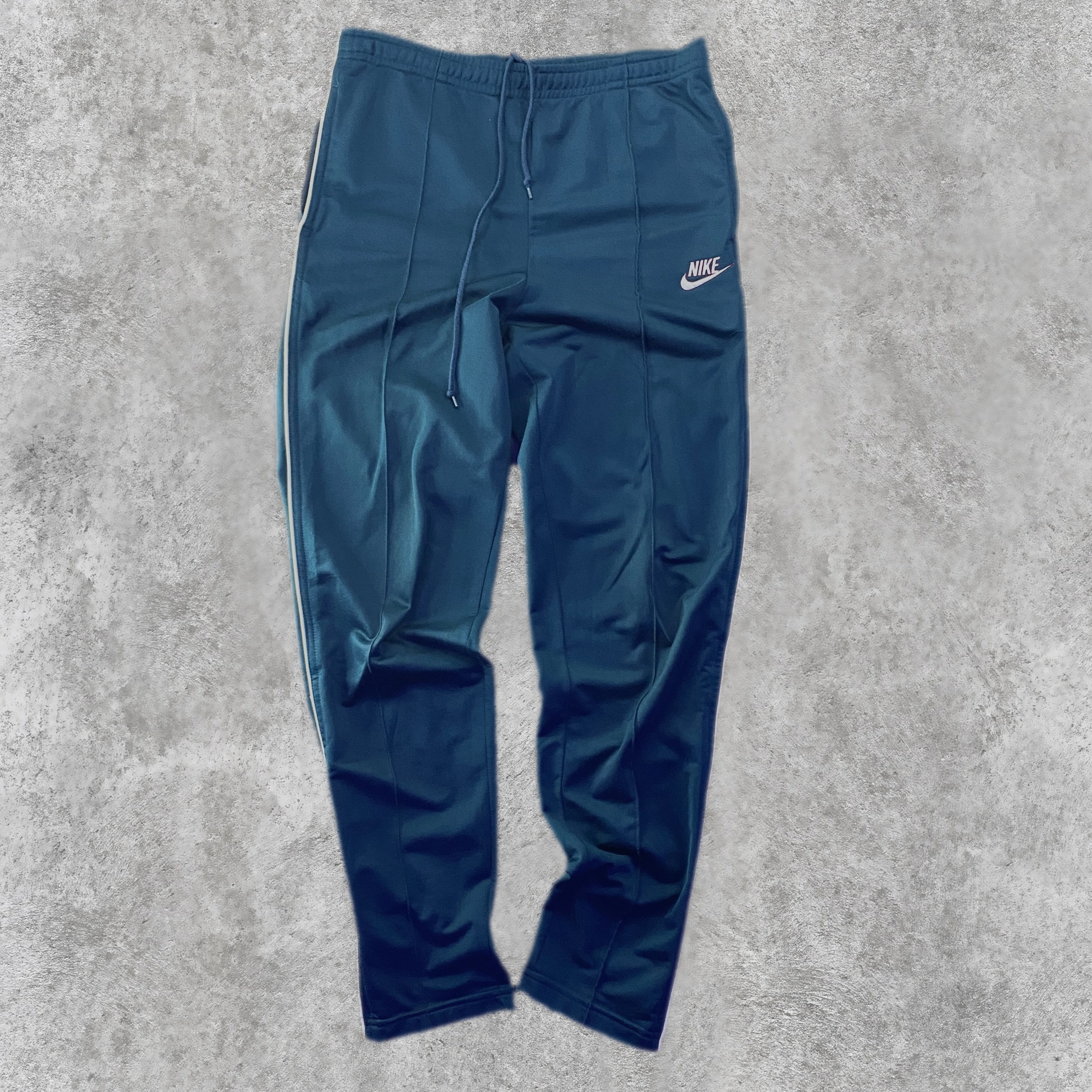 Pantalón Nike Chándal Azul Petróleo frontal