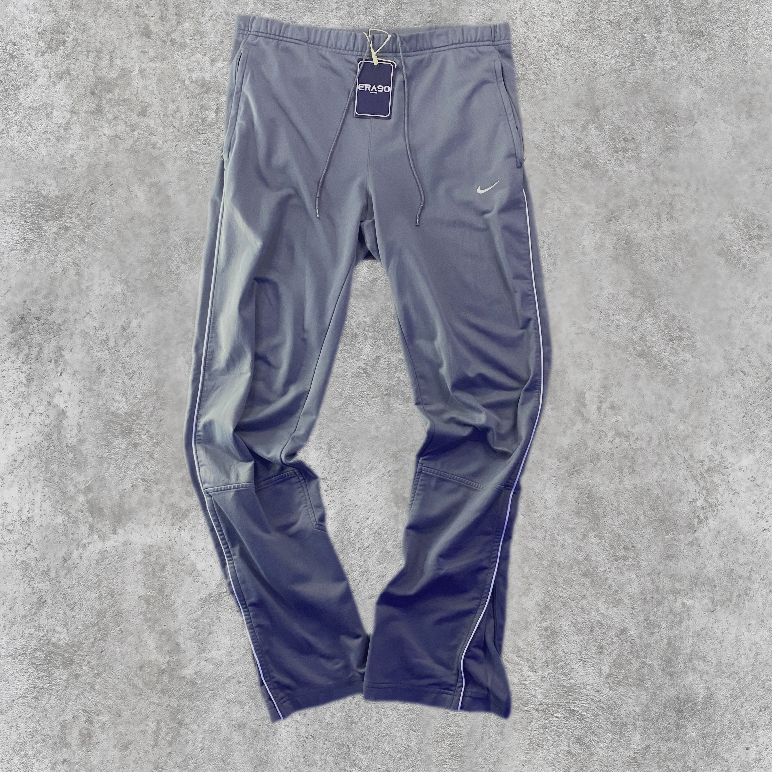 Pantalón Nike Chándal Gris Grafito frontal