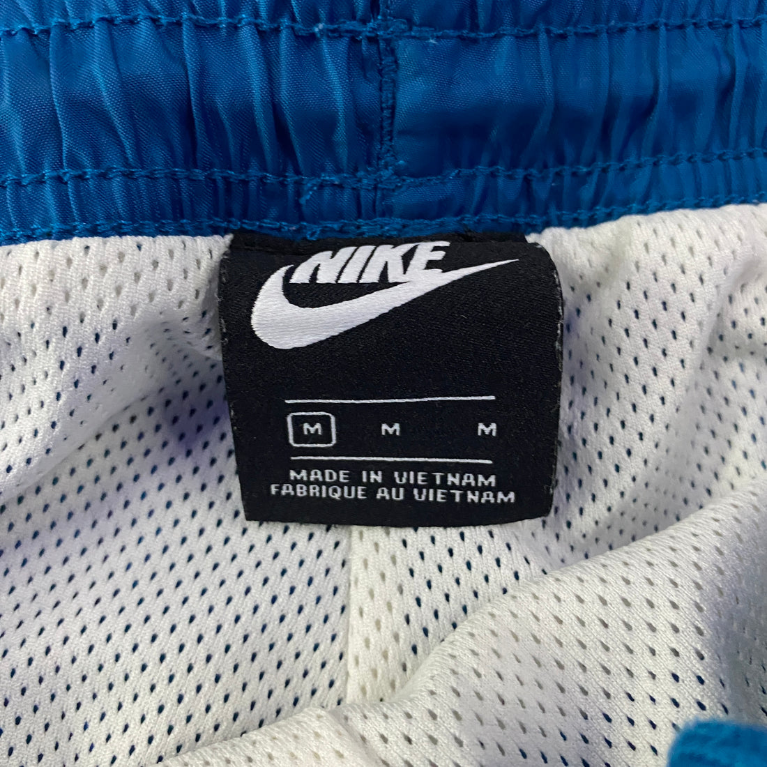 Pantalón Cortavientos Nike Paneles Blanco y Granate Azul