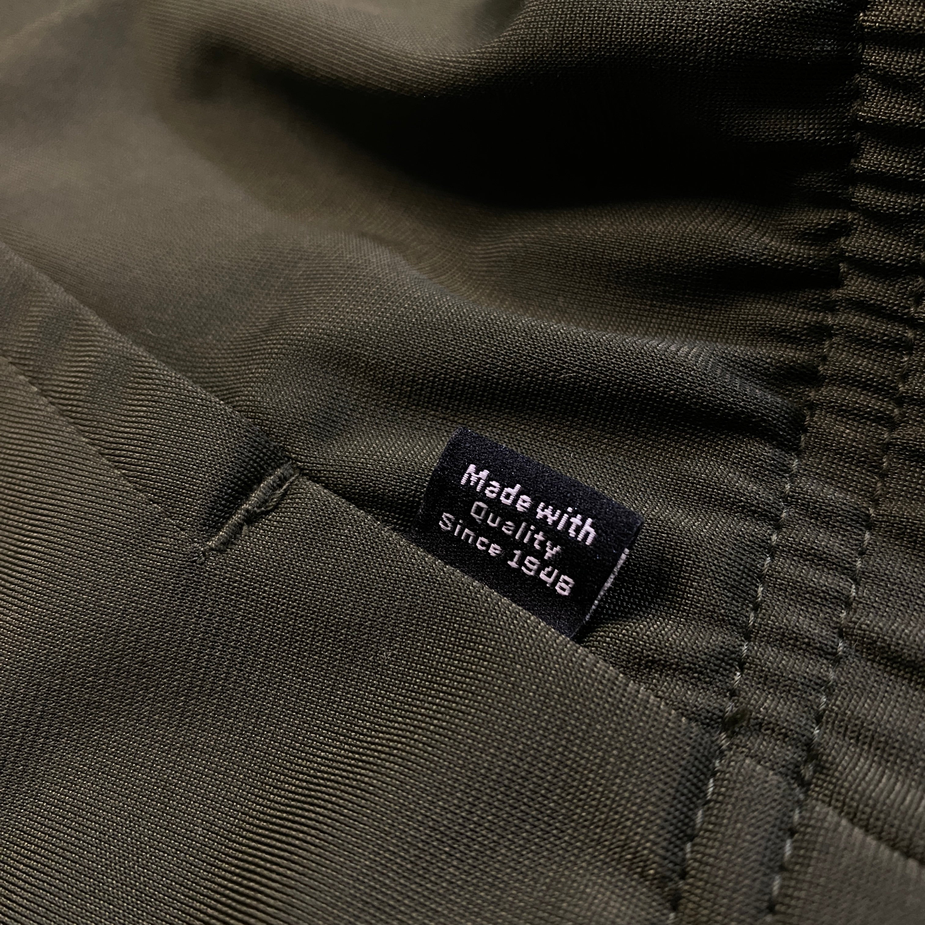 CHAQUETA PUMA VERDE OSCURO CON PANEL NEGRO