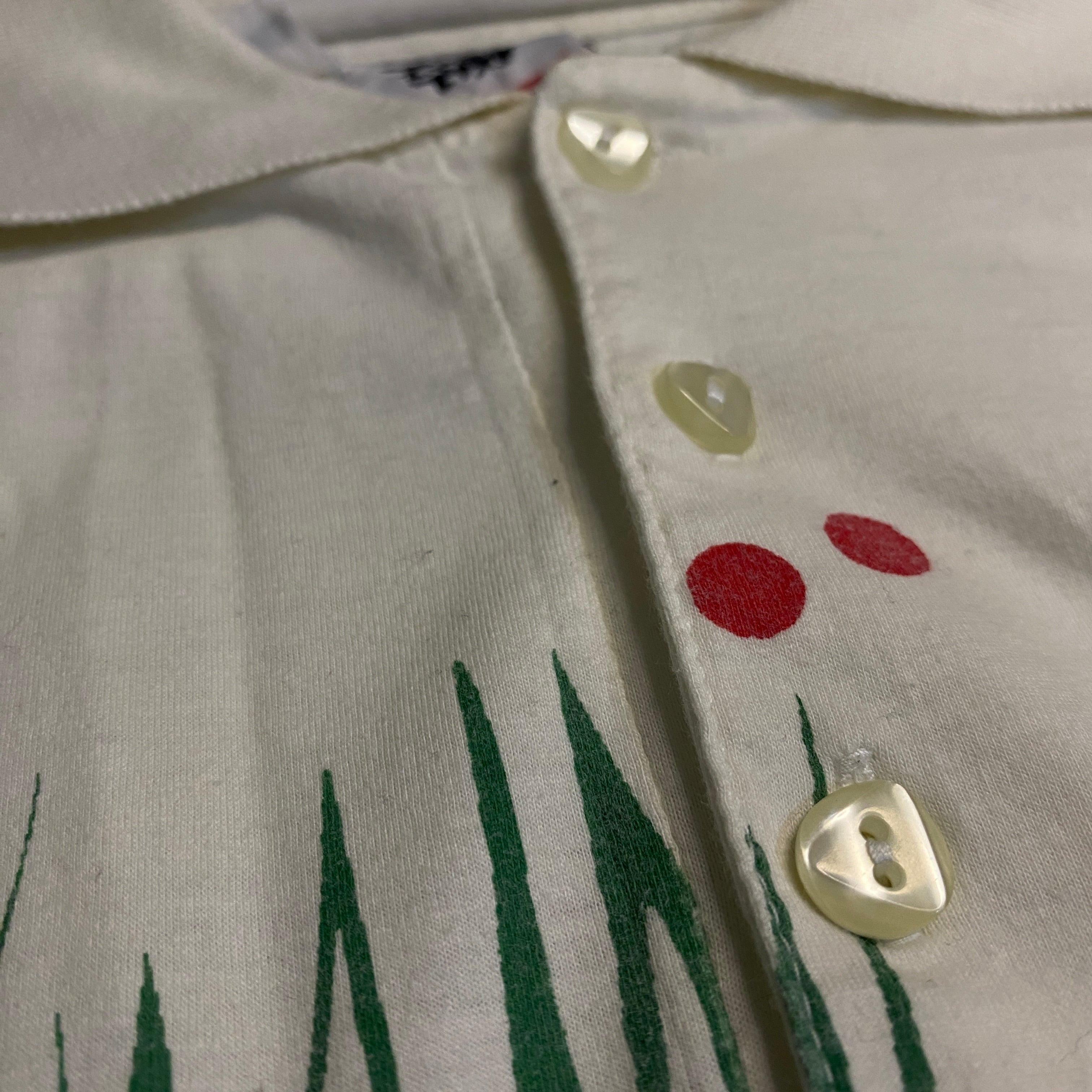 POLO DIESEL BLANCO CON PRINT GRÁFICO Y HEXÁGONOS