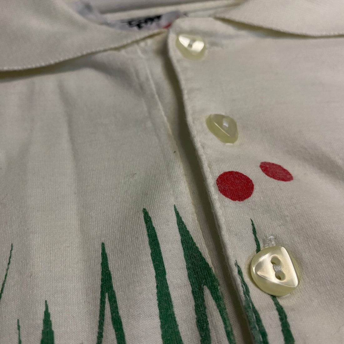 POLO DIESEL BLANCO CON PRINT GRÁFICO Y HEXÁGONOS