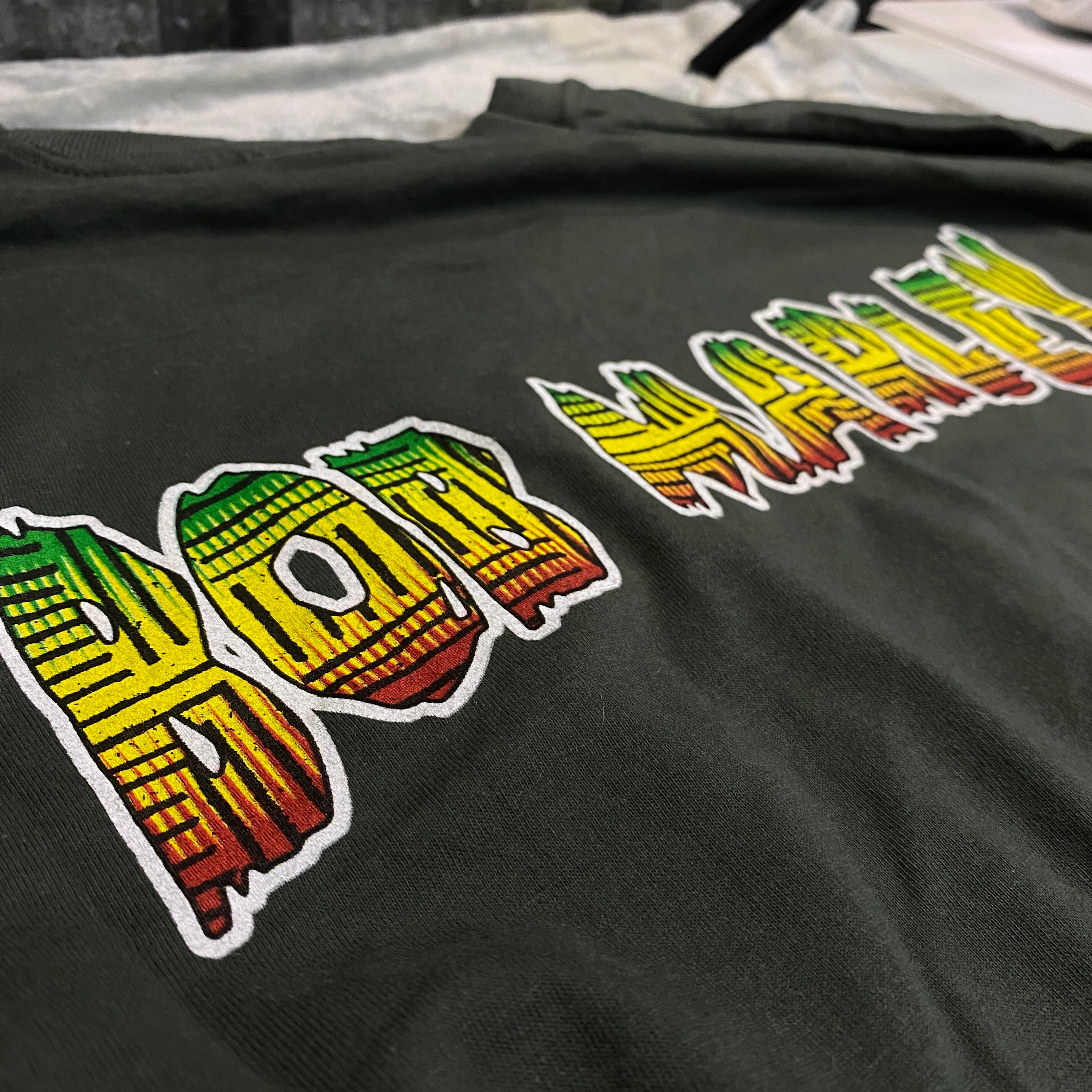 CAMISETA WMB "BOB MARLEY" VERDE OSCURO L