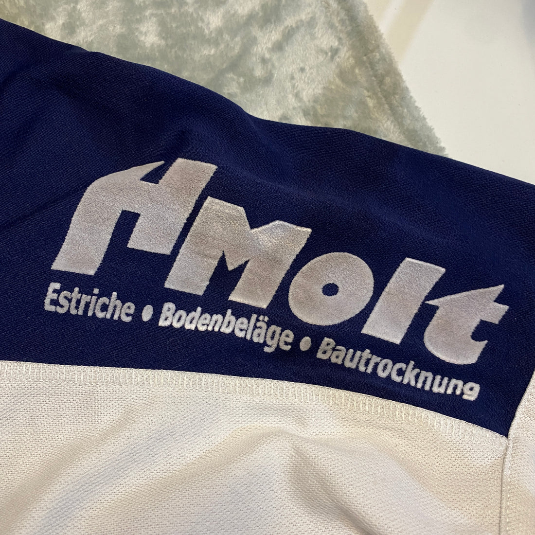 CAMISETA HUMMEL ATSV STOCKE LSDORF 7 AZUL MARINO TALLA XL