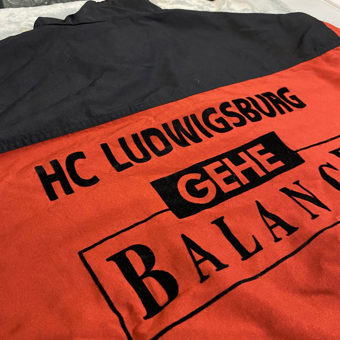 CHAMARRA HC LUDWIGSBURG GEHE BALANCE NARANJA NEGRO TALLA XL