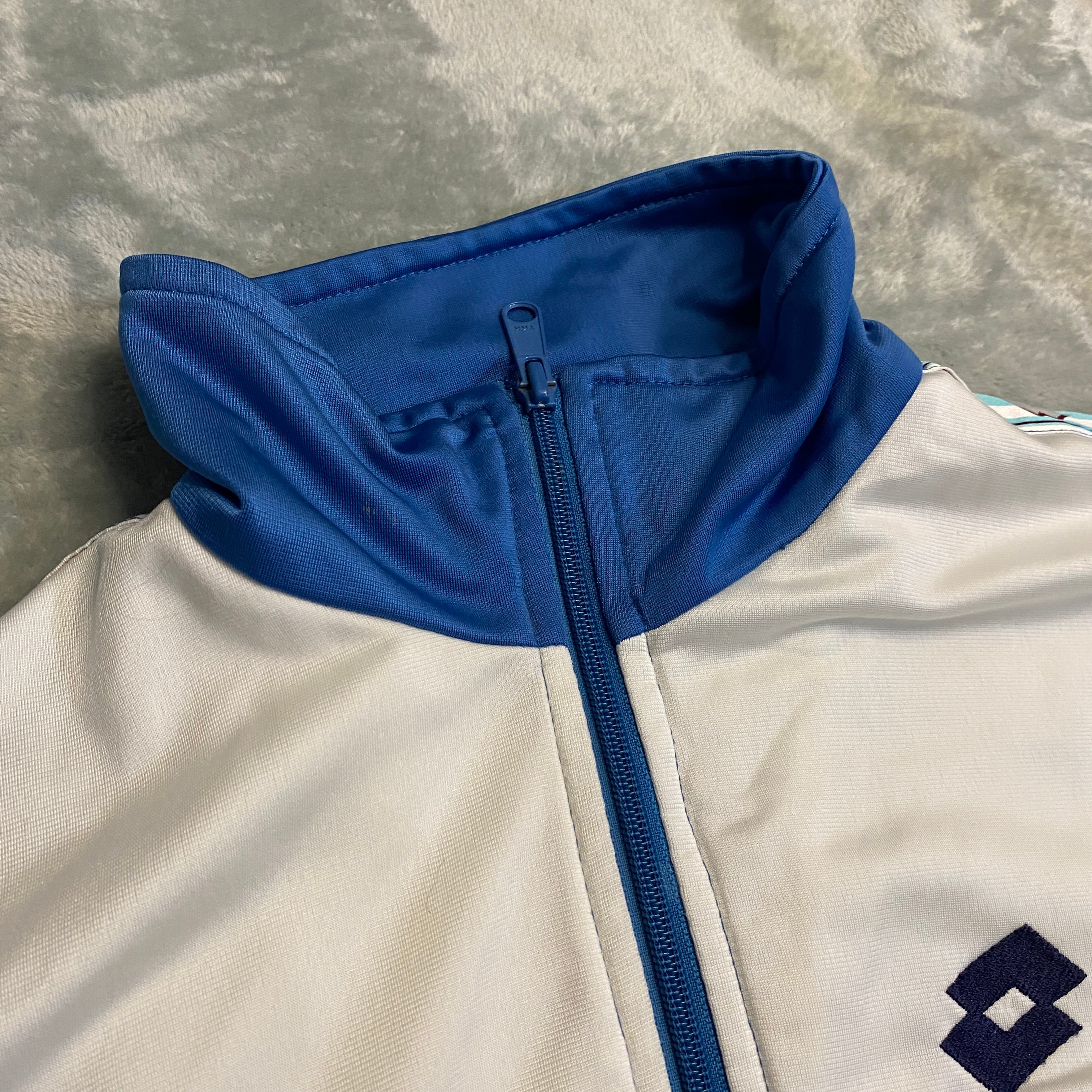 CHAQUETA TRACK LOTTO AZUL Y BLANCO TALLA M